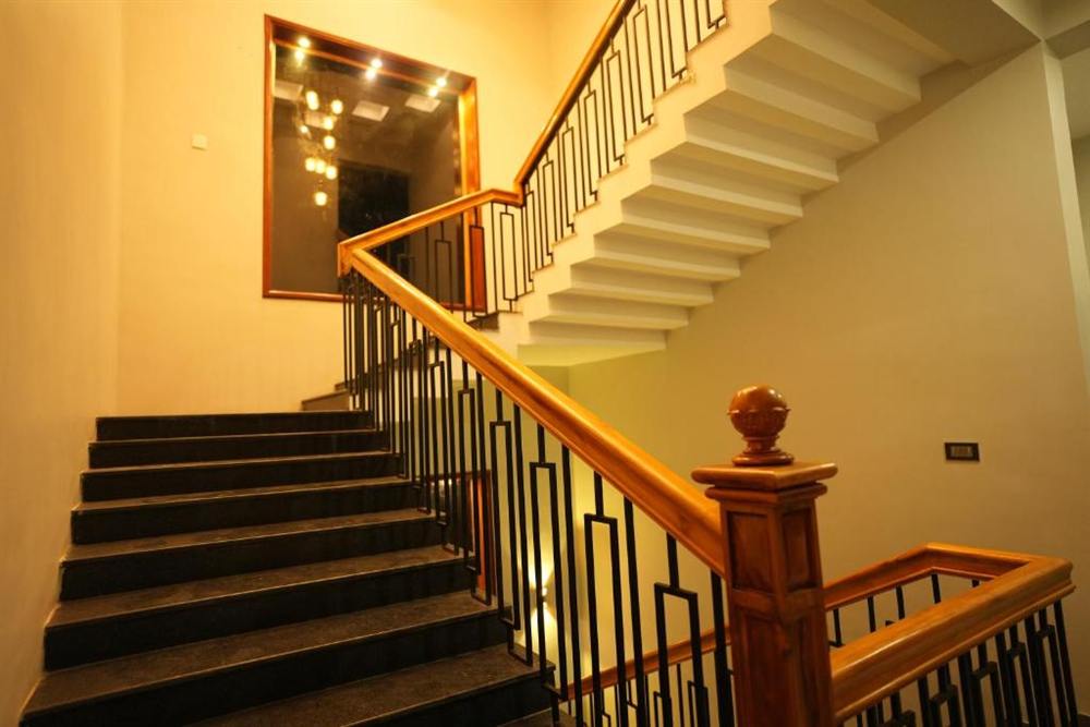 Wooden staircase with a mirror